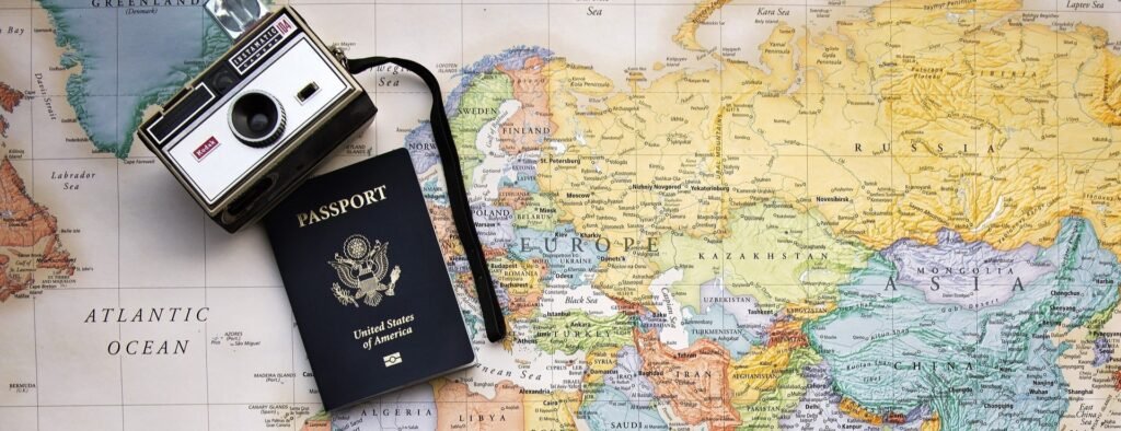 Planning Your Visit- Picture of passport and vintage camera 2